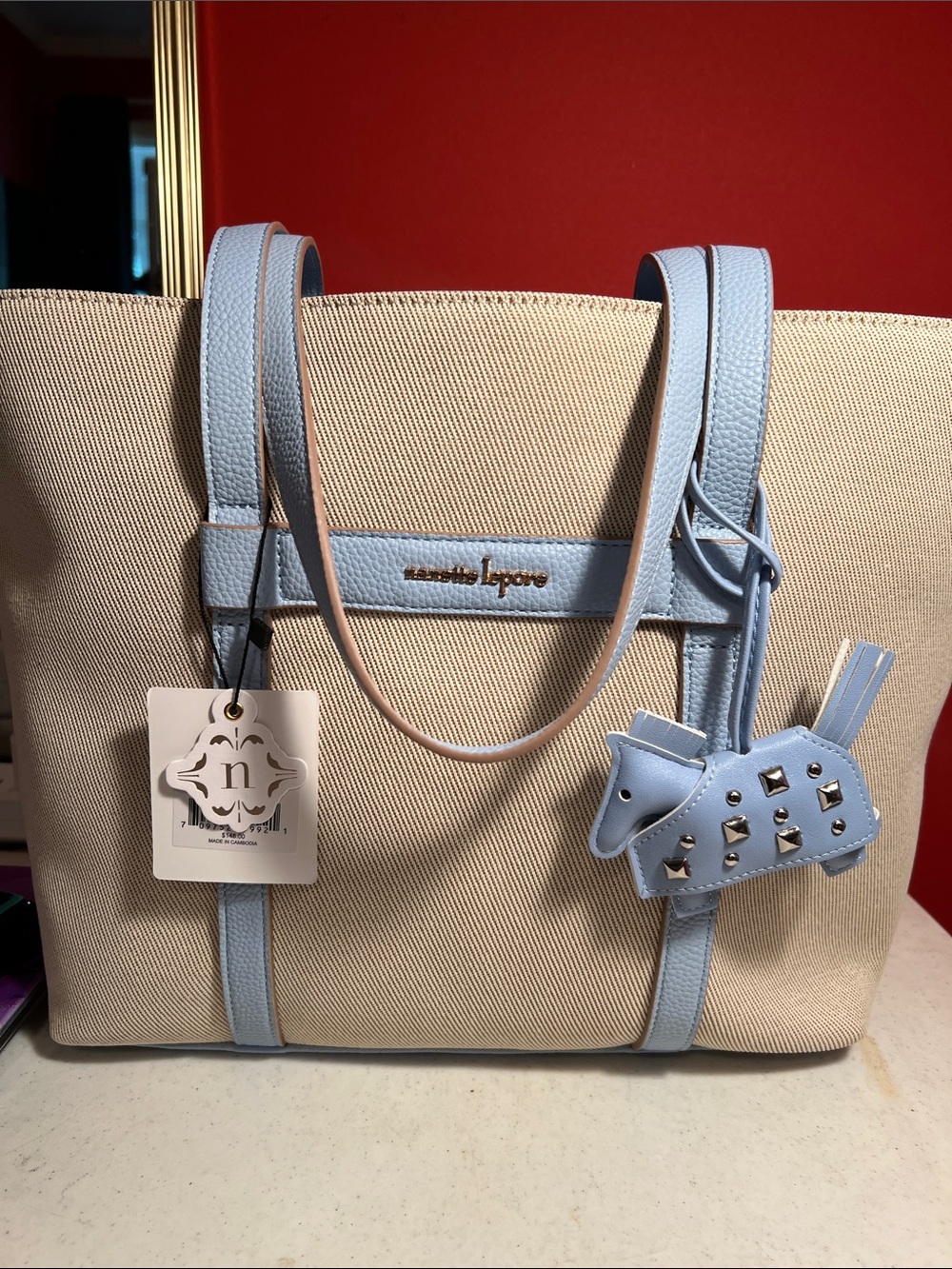 Nanette Lepore Beige Canvas Tote with Light Blue Leather Trim and Charm  RT,148